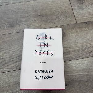 Girl in Pieces Hardcover Book